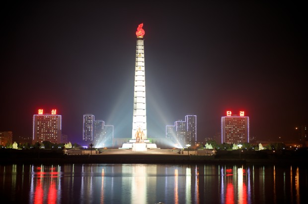 Juche Tower in Pyongyang, North Korea at night. Juche is the North Korean ideology translating to "self-reliance." Notice the similarities to the Derg Monument. 