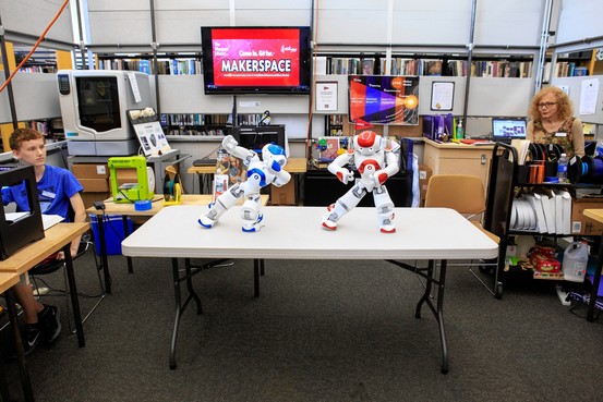Robots do tai chi at the Westport Library. (Image courtesy of Danny Ghitis for The Wall Street Journal)