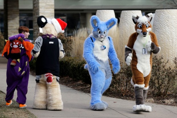 Furries evacuated from Chicago hotel. AP Photo/Nam Y. Huh