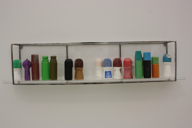 Andy Coolwitz at Lisa Cooley. These are derelict deodorant bottles that washed up on the beach. They're not only strangely phallic, but reference a bathroom shelf where one might keep both toiletries and decorative accents like seashells. 
