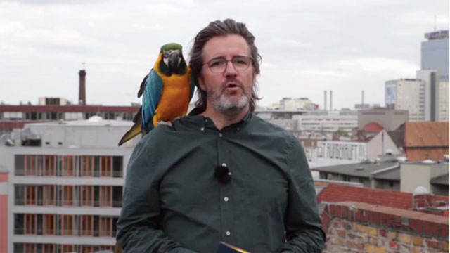 Artist Olafur Eliasson and his parrot