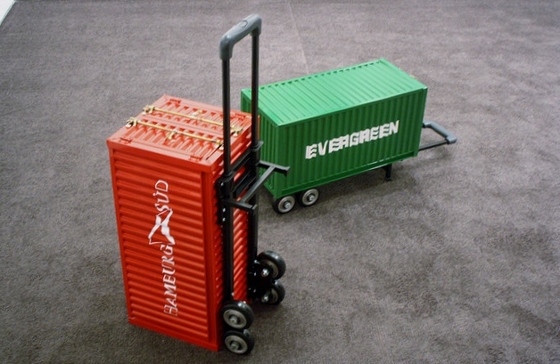 Also at High Art, Pentti Monkkonen's "Carry On Container" series, which reproduces cargo containers at the scale of luggage. These are playful and perfect for Miami