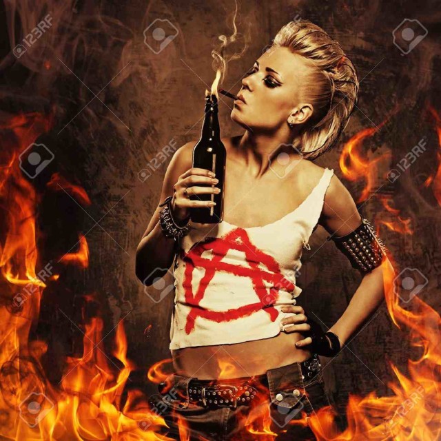 12221628-Punk-girl-smoking-a-cigarette-over-fire-background--Stock-Photo