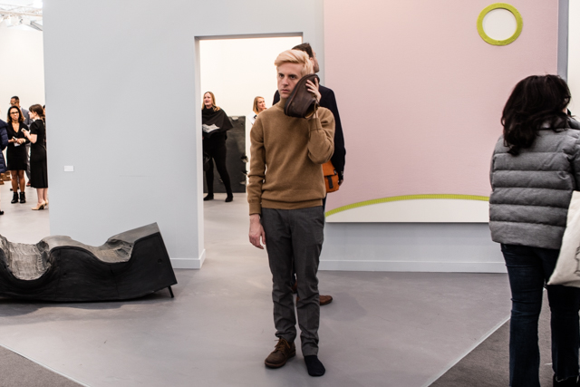 Erwin Wurm, take off one shoe and listen for a while, performance at Lehmann Maupin 