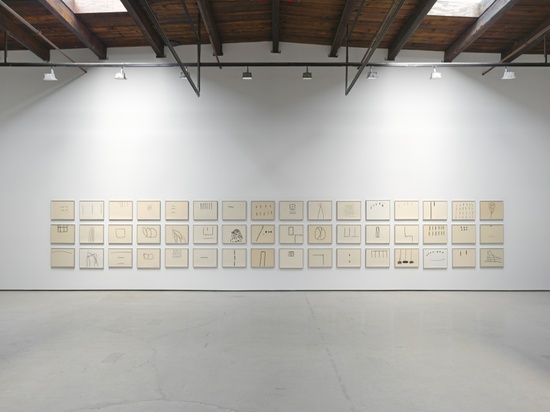 Installation view of Philip Guston's charcoal and ink-and-brush drawings on paper. 