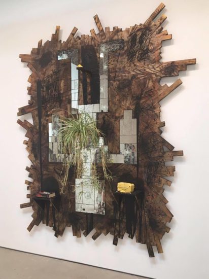 Rashid Johnson, Falling Man, 2015, burned red oak flooring, spray enamel, mirror, black soap, wax, shea butter, book, plant (photo by author for Art F City)