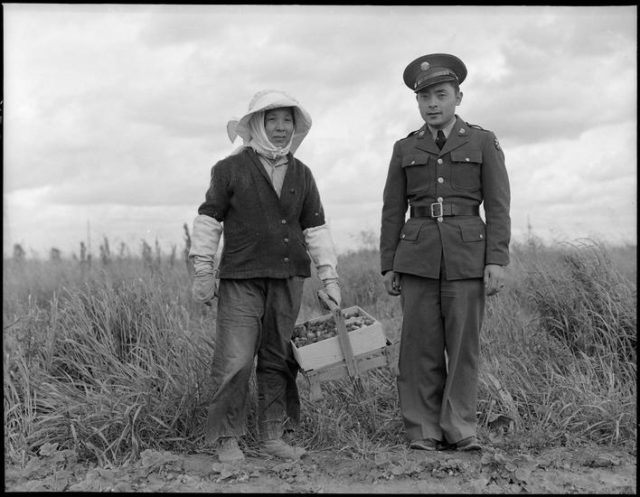 Dorothea Lange, Florin, Sacramento County, California. A soldier and his mother in a strawberry field, 1942, Inkjet print (Courtesy the artist and Marianne Boesky Gallery)